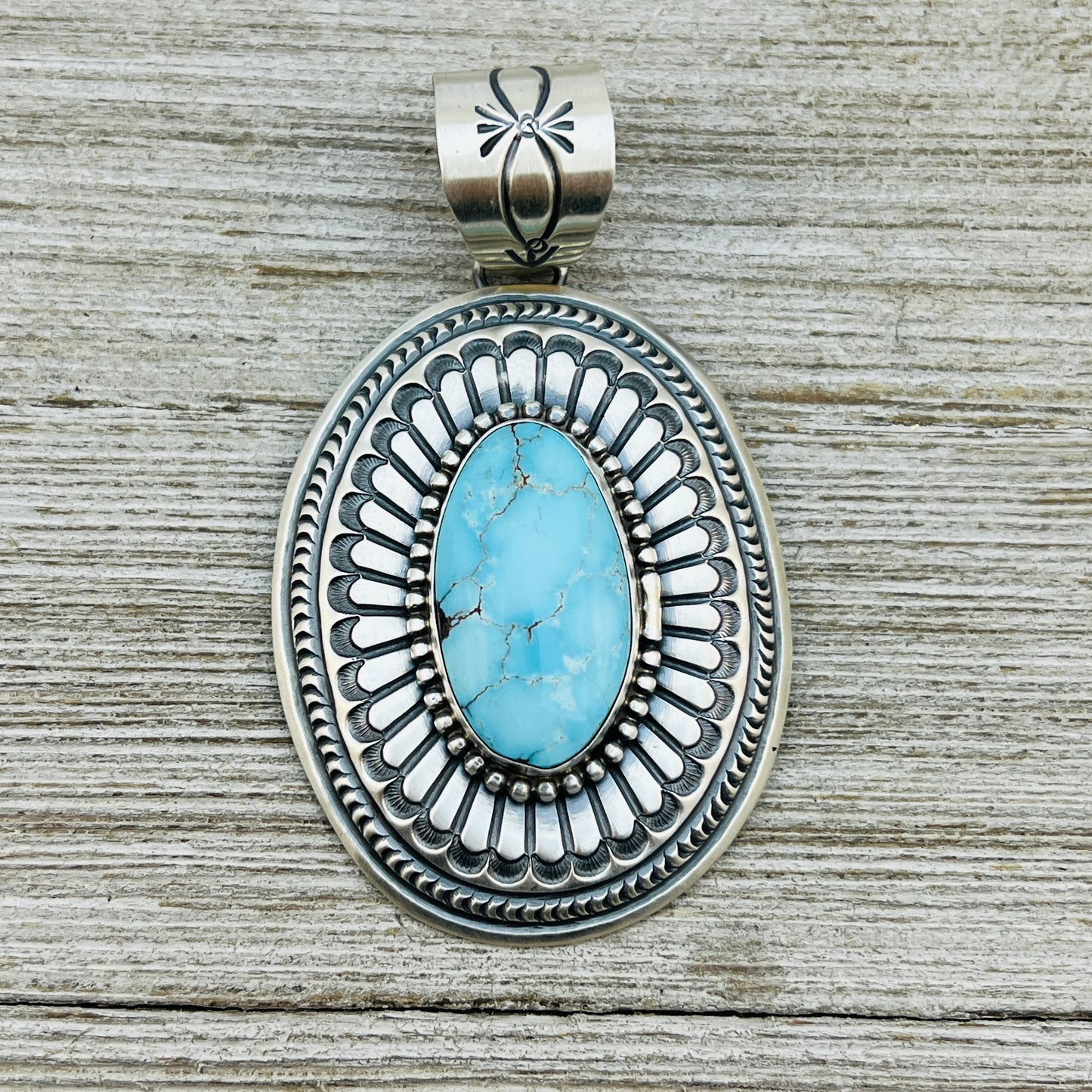 Natural Egyptian Light Blue Turquoise Stamped concho pendant Arnold Blackgoat Sterling silver