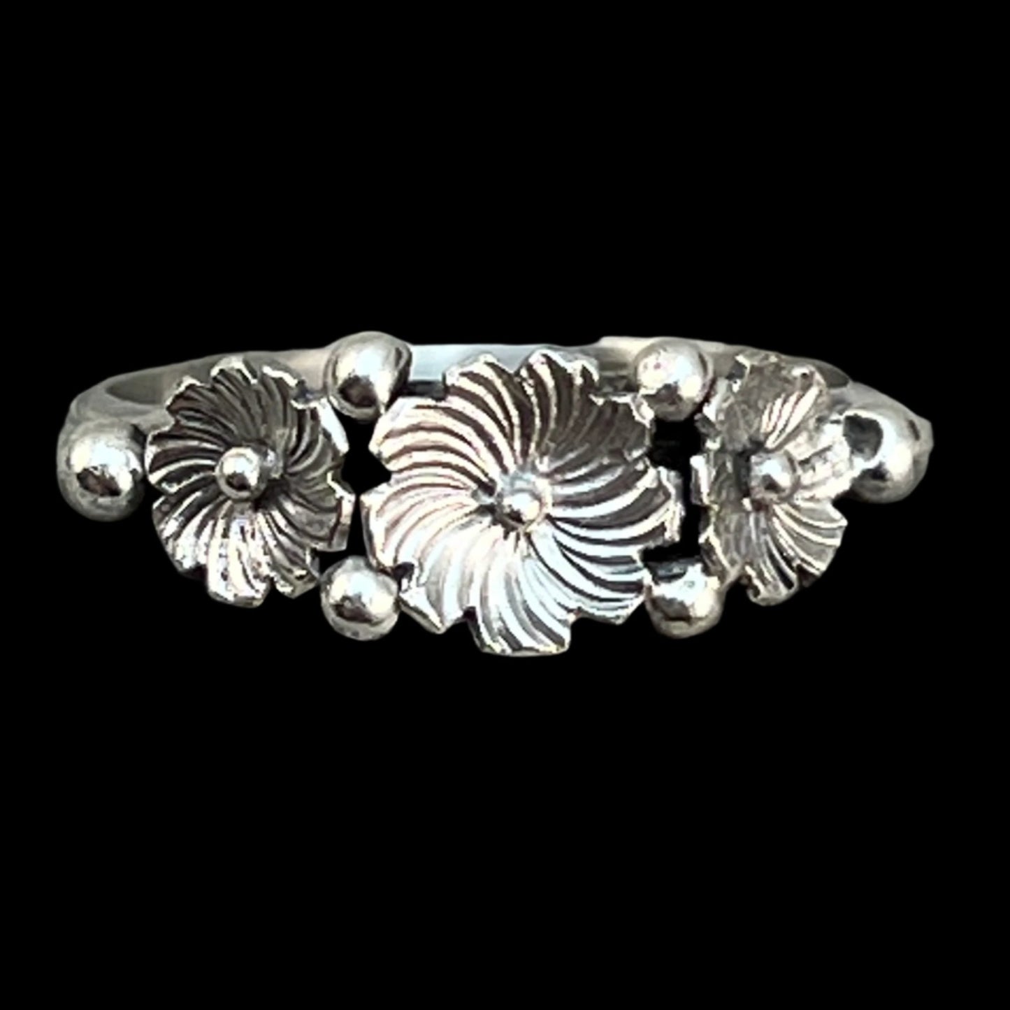 size 5.5 Sterling silver narrow skinny band, floral ring, Rita Montoya